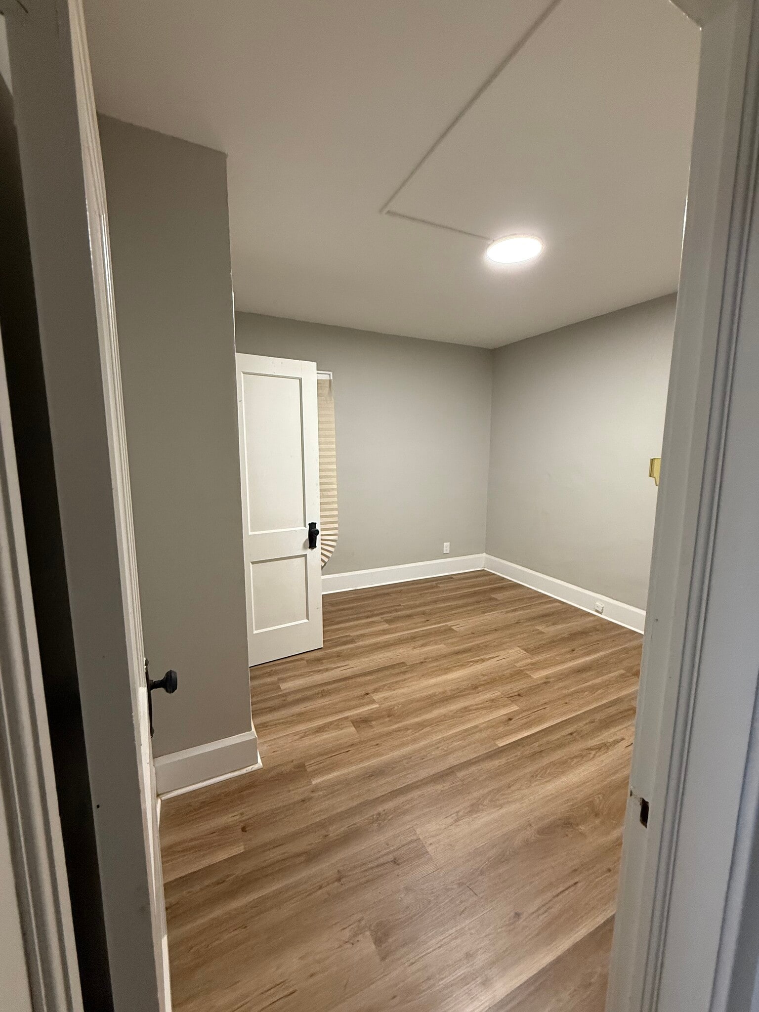 2nd bedroom with closet and vinyl flooring - 3616 E 106th St