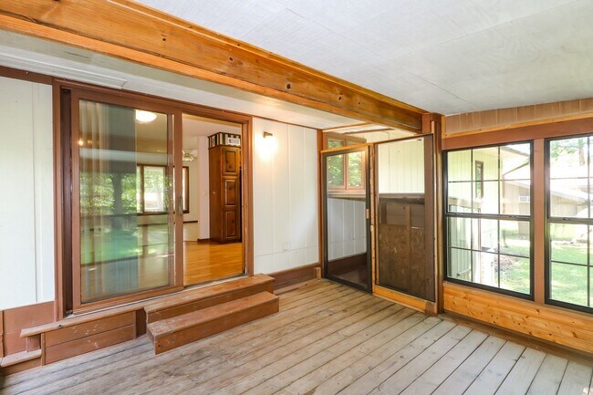 Building Photo - Two Bedroom, 2 Bath, 1-Car Garage, 1179 sq ft feet home with wood burning fireplace. and screened...