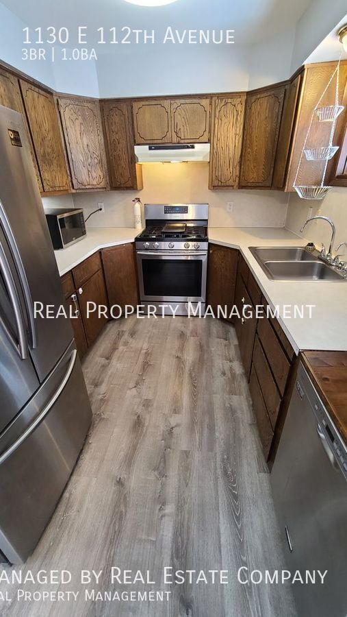 Building Photo - 1130 E 112th Ave