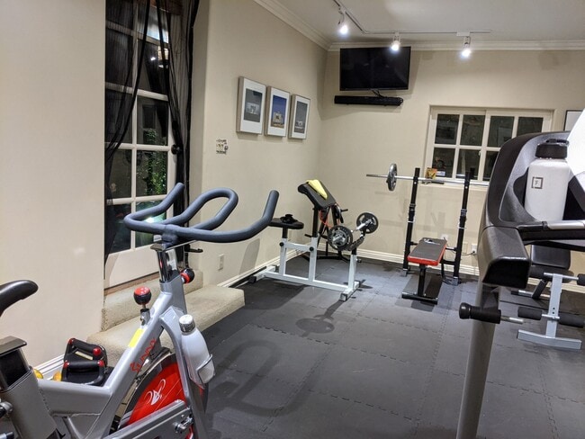 Hit the bike AND binge watch... - 1103 S Crescent Heights Blvd