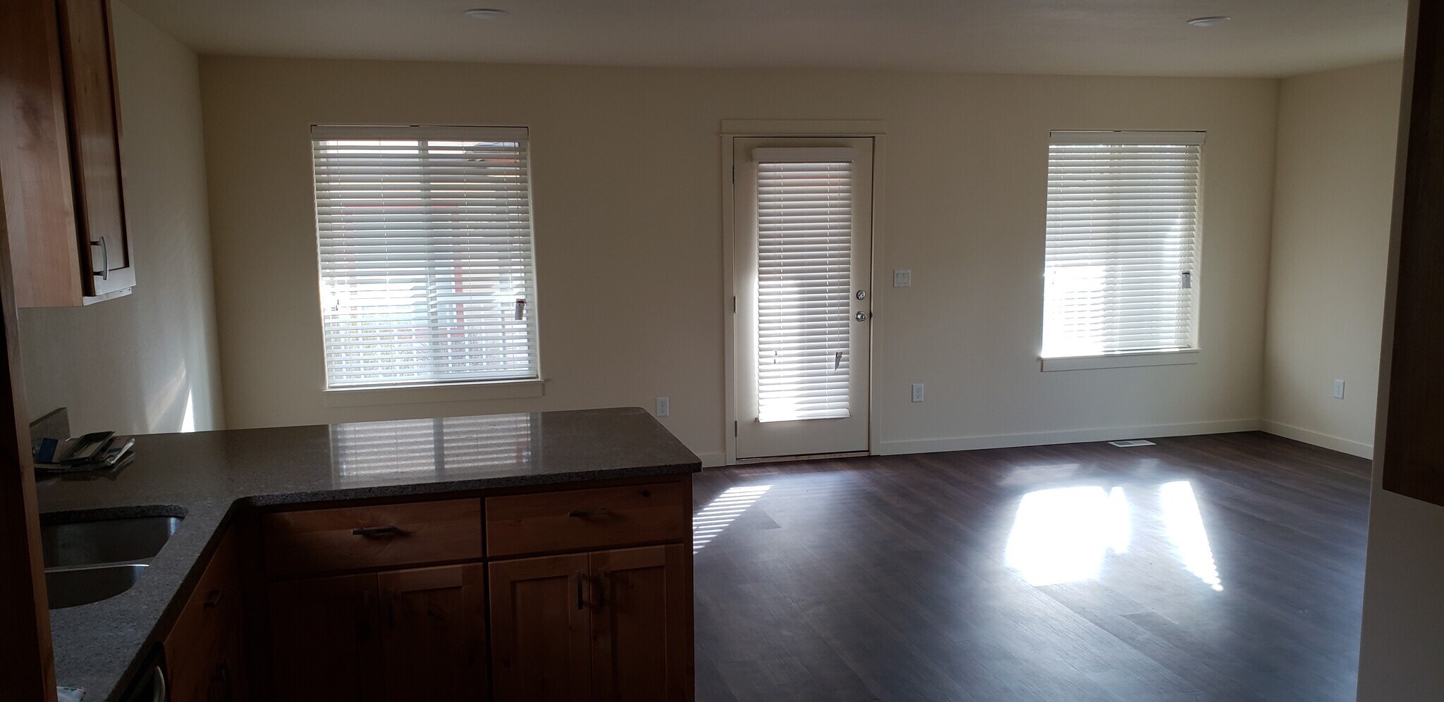 Open and spacious kitchen, living room, and dining room - 1121 Sundial Ln