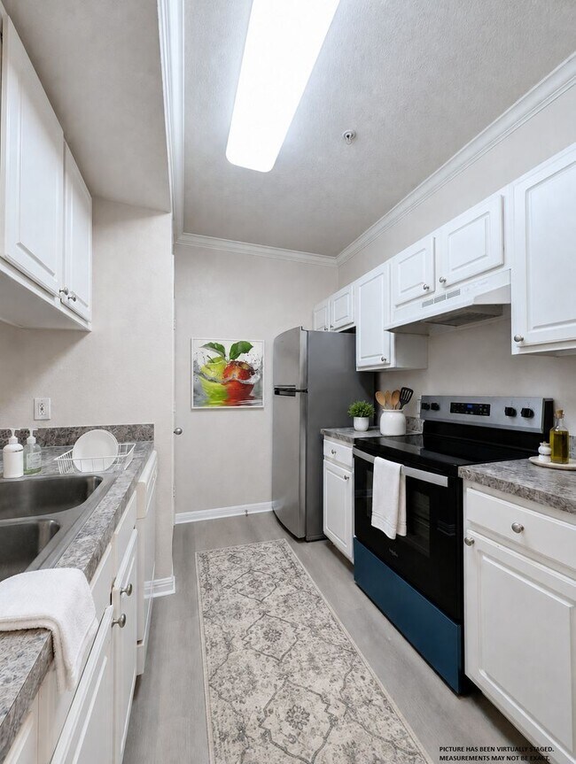Building Photo - Peaceful, quiet & comfortable! New Vinyl Plank flooring & Appliances