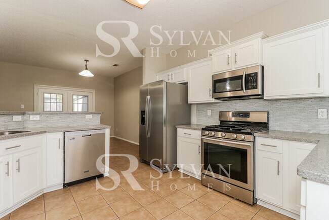 Building Photo - Turn the key. Enter. Smile. Repeat every day!