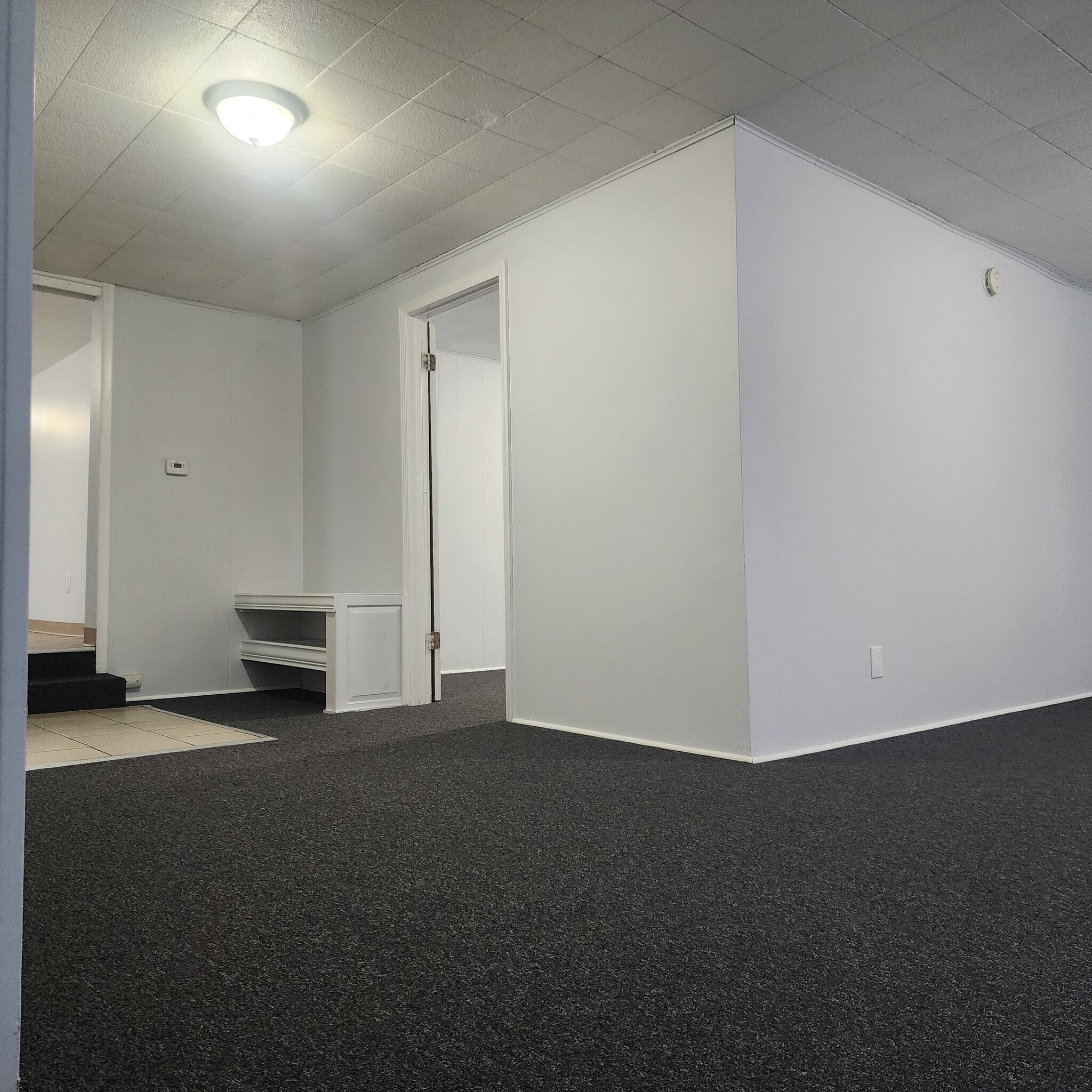 Living room looking towards back bedroom/kitchen - 396 Norton St