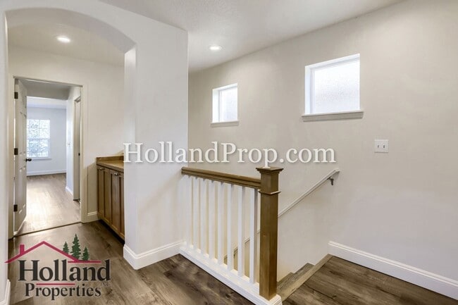 Building Photo - Charming 3-Bedroom Home with Wood Floors, Gas Fireplace & Private Patio