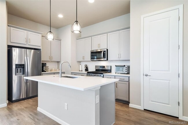 Building Photo - New ranch style home with a finished basem...