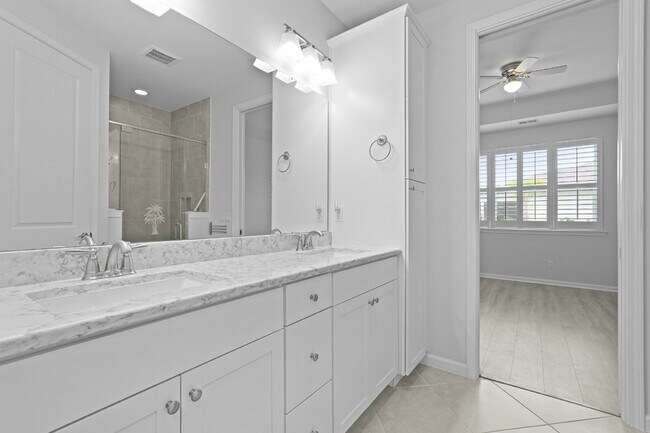 Building Photo - "Charming 2-Bedroom Retreat with 2 Baths and Den - 1558 Sq. Ft. of Comfort in Latitude Margaritav...