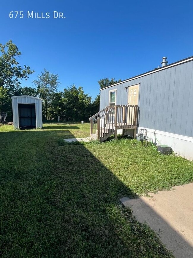 Building Photo - 675 E Mls Dr