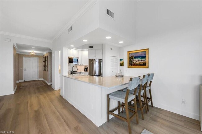 Building Photo - 7040 Pelican Bay Blvd