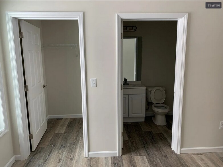 Primary Bathroom and Closet - 9029 Landon Ln