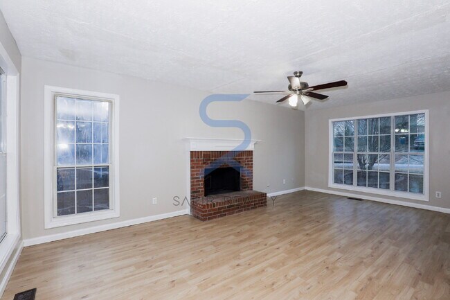 Building Photo - Move in before February 28th and choose your reward: a $250 Amazon Gift Card or a 55" Smart TV!