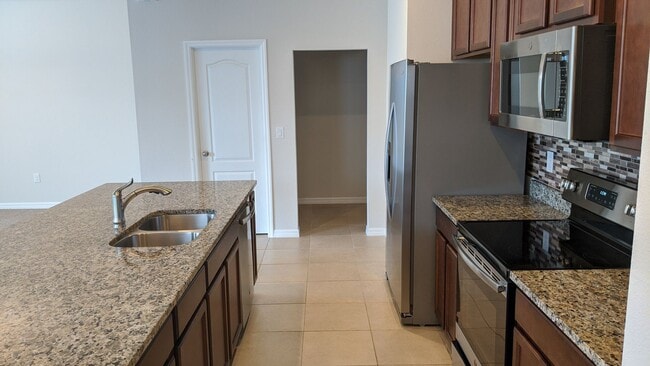 Building Photo - Stunning 2 Story 4-Bedroom Home In Serenoa Community – Clermont, FL