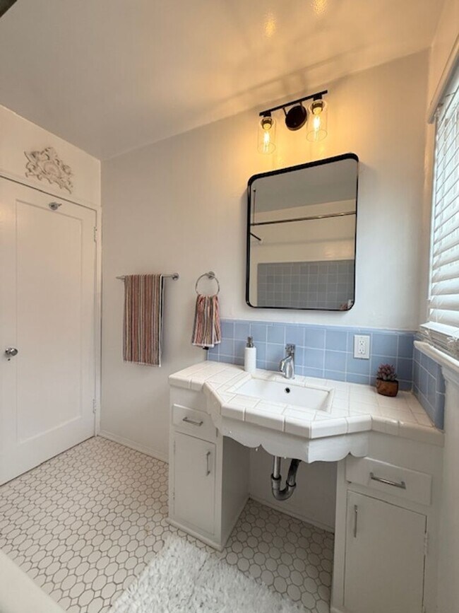 Building Photo - Bungalow - 1 bedroom + Office = natural wood floors, mini split a/c , new appliances, private pat...