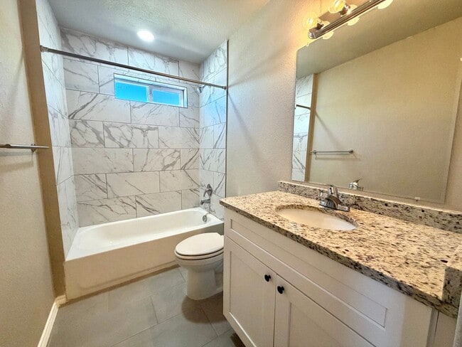 Building Photo - Modern 3BR Townhome w/ Garage, Private Yard & No Carpet – Built 2022