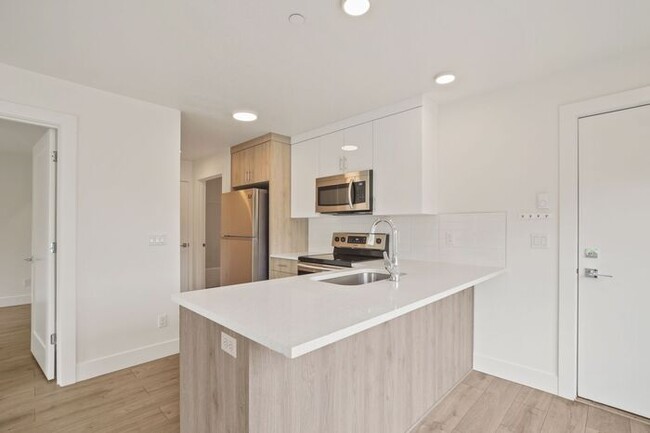 Building Photo - Sunnyside 12 Apartments Available! 1 bed, ...