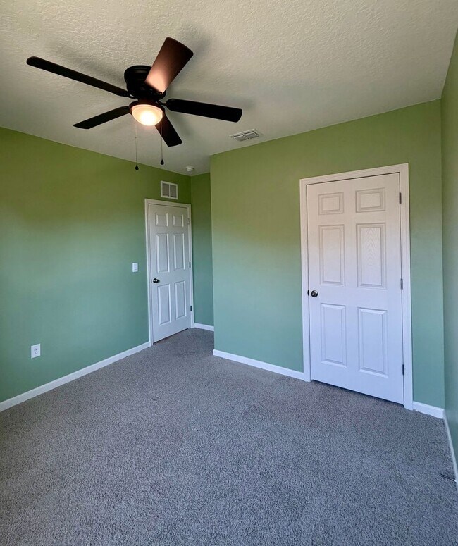 Building Photo - Palm Bay Pool Home Stunner!