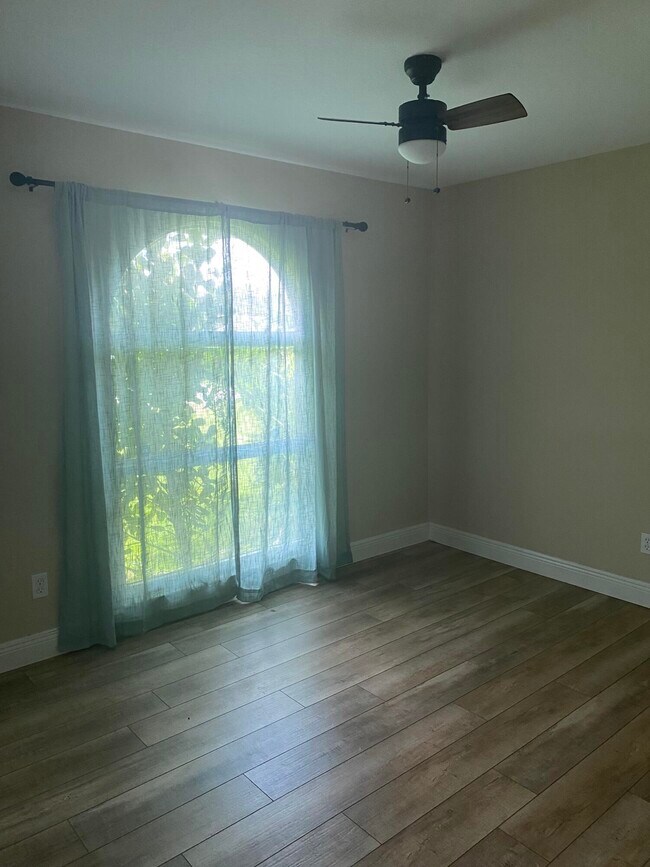 Building Photo - 3196 SW Areca Dr