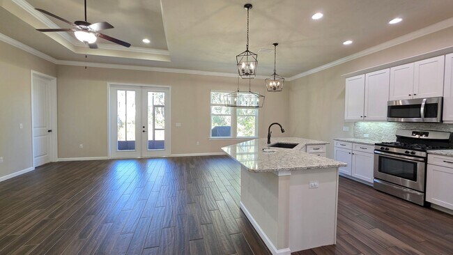 Building Photo - FOR RENT 4 BEDROOM 3 BATHROOM HOME
