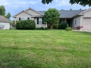 Building Photo - Spacious Duplex in Walker! Two Stall Garage!