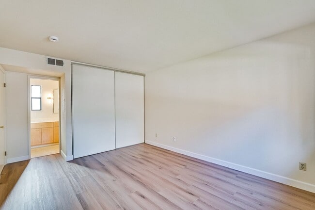 Building Photo - New Vinyl Plank Flooring, Fresh Interior Paint, 1 Car Garage + 1 Assigned Outdoor Parking Space -...