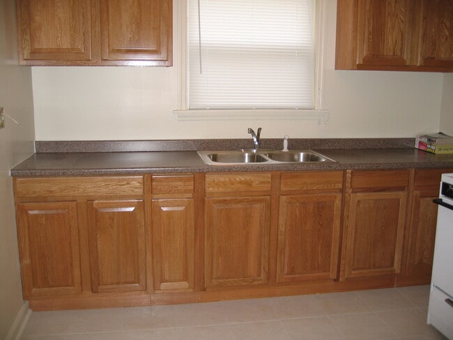 Kitchen with range, refrigerator,eating space - 861 McClain Rd