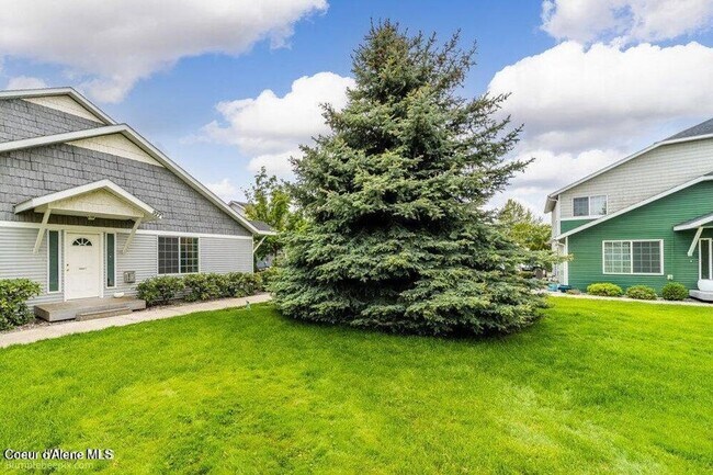 Building Photo - Beautiful Updated 3 Bedroom Condo with A/C, Garage & Fireplace in Forsythia Place!