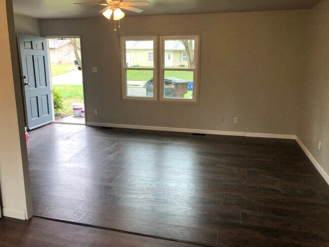 living room. new windows throughout - 1824 Miller Dr