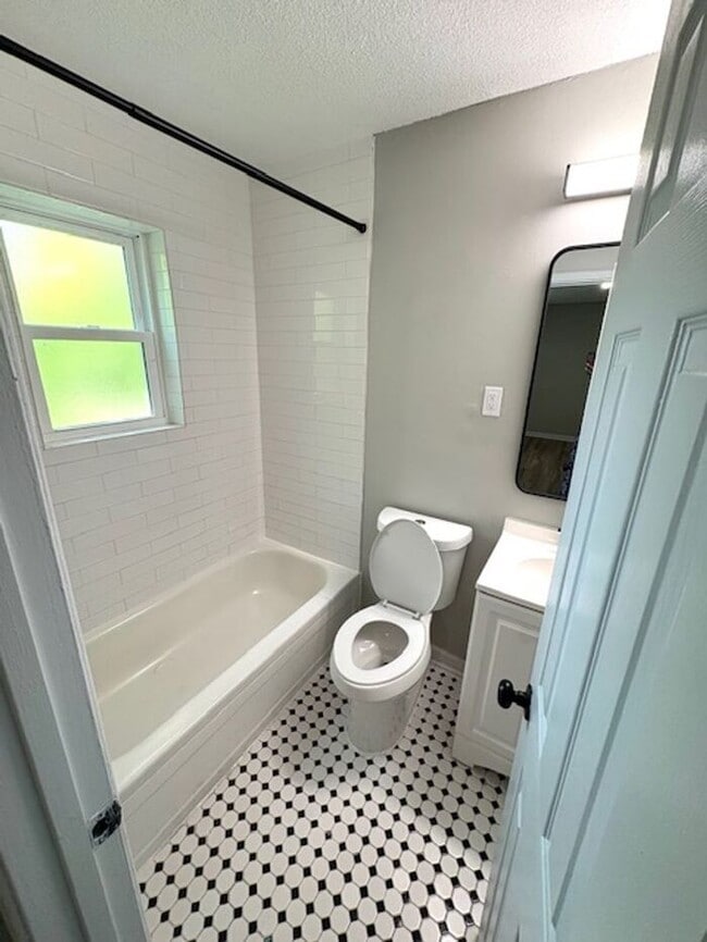 Building Photo - The Den: Where Comfort Meets Community