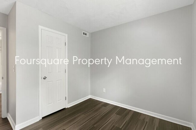 Building Photo - Charming 1st-Floor End-Unit Condo with Gas Log Fireplace, Private Back Porch & Community Pool – T...