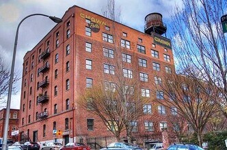 Building Photo - Historic Chown Pella Lofts - east facing studio w/parking/most utilities/rooftop deck