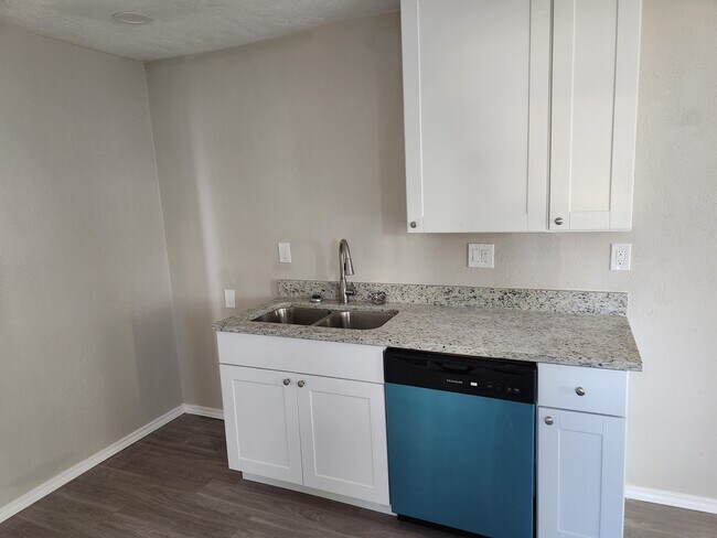 Kitchen includes dishwasher - 202 N Getzendaner St