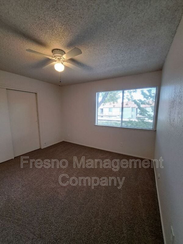 Building Photo - 4765 N Cedar Ave