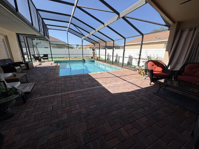 Building Photo - Spacious 4-Bedroom Oasis with 3 Full Baths in the Beautiful Community of Indian Lakes in St. Clou...