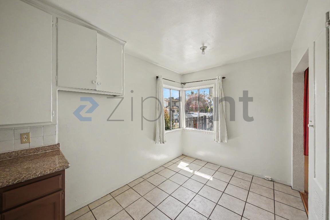 Building Photo - 7027 Holmes Ave