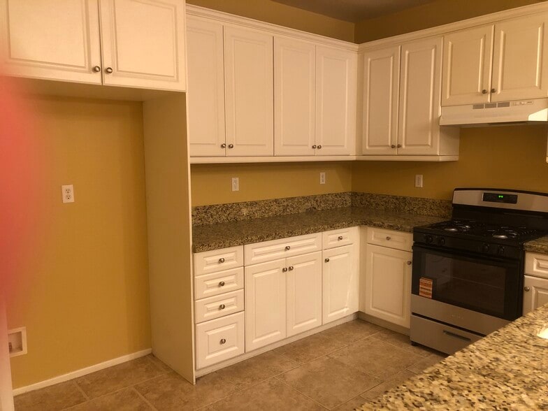 Kitchen area ,new appliances ,plentycabinet spaces . - 6395 Delgado Ln