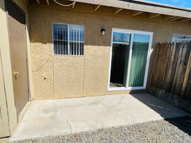 Building Photo - Two Bedroom With A/C, Fenced Yard and Wash...