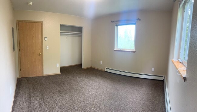 Bedroom # 1 Versatile bedroom space perfect for a guest room, home office, or cozy retreat. - 2979 Badger Rd