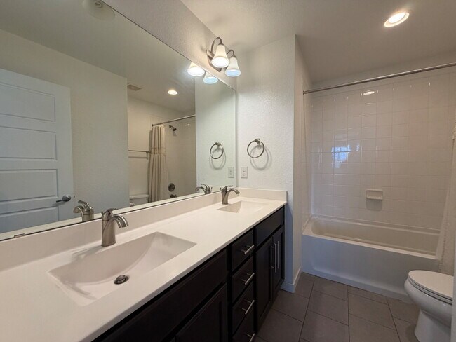 Building Photo - Georgous Three Bedroom Home in Reunion with Private Office, Loft & Chef’s Kitchen!