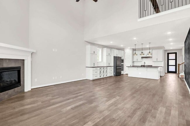 Building Photo - "Spacious 4-Bedroom Sanctuary with Cozy Fireplace in San Antonio's Prime Location!"