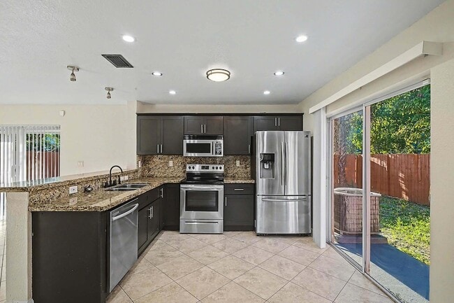 Building Photo - 5789 Woodland Point Dr