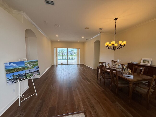 Building Photo - Luxurious 4 Bedroom 3 Bath Lakefront Pool Home W/3-Car Garage