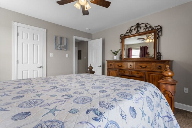 Building Photo - Welcome to Coastal Living at Harbor Landing Condominiums!