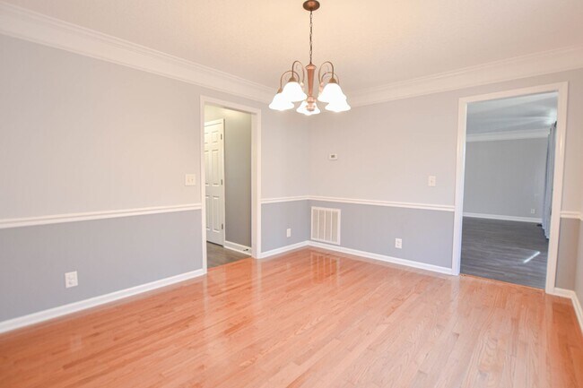 Building Photo - Pet Friendly Three Bedroom with Bonus!