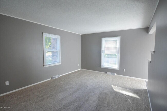 Building Photo - Cape Cod style home - completely updated throughout!
