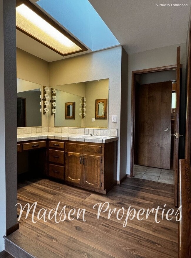 Building Photo - 6367 Woodman Dr