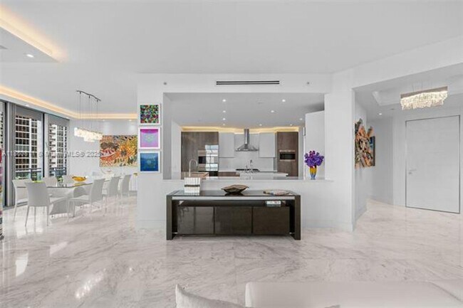 Building Photo - 10295 Collins Ave
