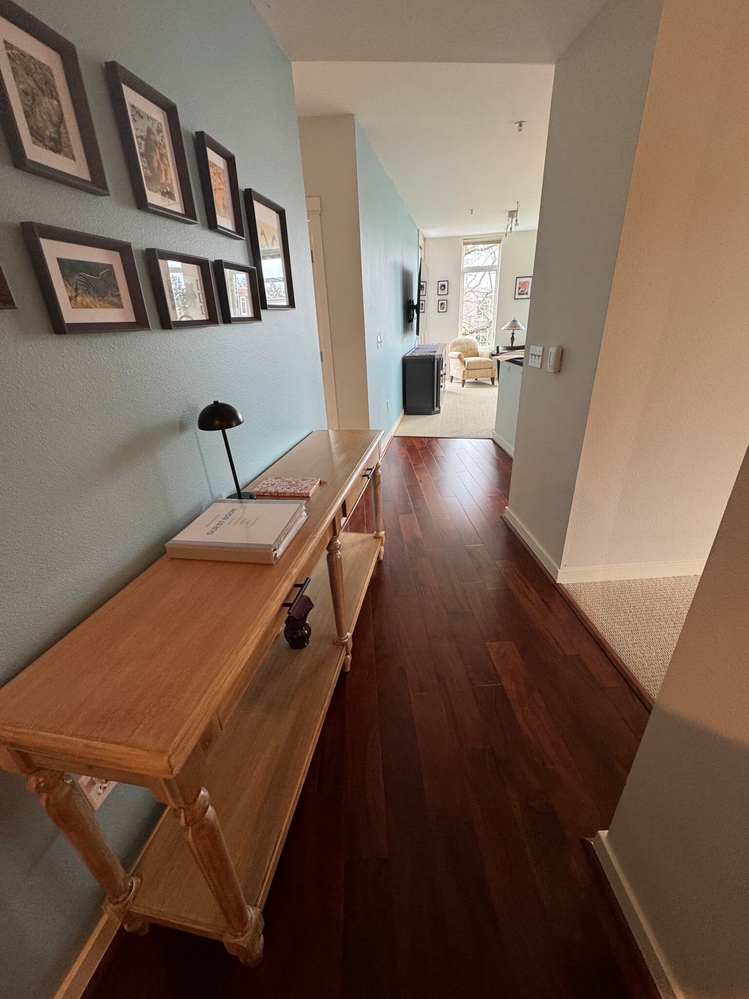 entryway table, looking toward living room/kitchen area - 190 Harbor Sq Loop NE