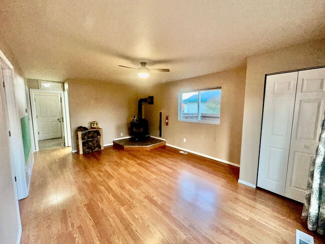 Building Photo - Check out the private fenced backyard!