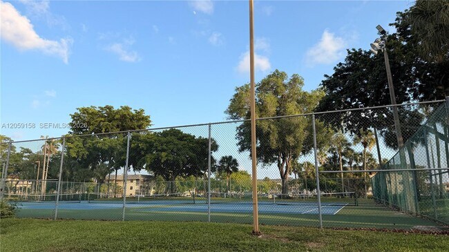 Building Photo - 6090 N Sabal Palm Blvd
