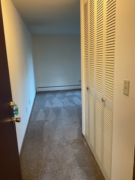 Front Entry & Coat Closet - Apartment Homes of Wildwood Preserve in be...